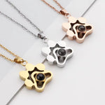 Trendy and fashionable dog paw print projection necklace